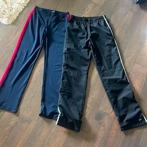 2 Nike warm-up/workout pants. Price is for both.